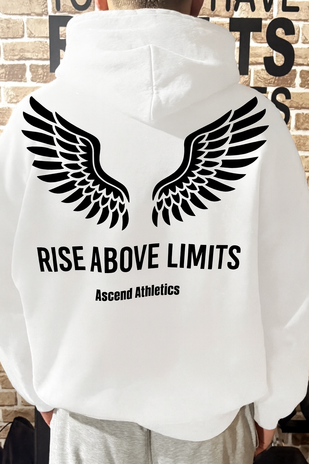 Unisex “Rise Above Limits” – Heavy Blend Hoodie